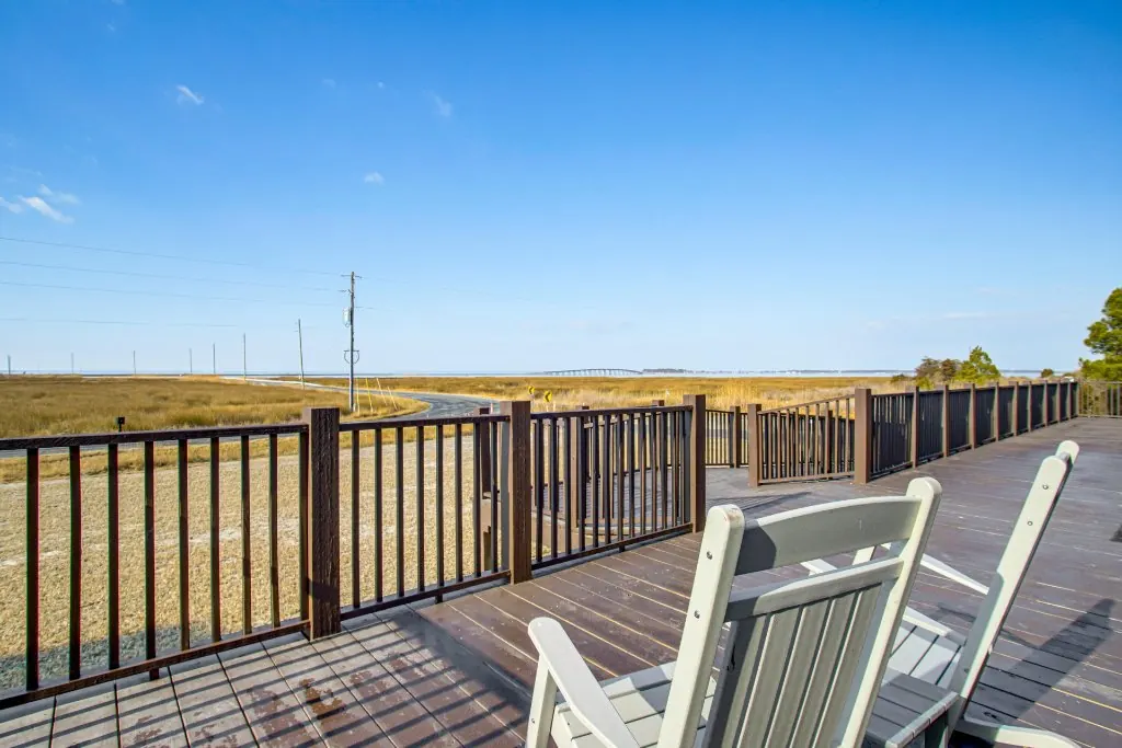 The front deck at The Bayside Escape, looking across the road to the marsh and the bay