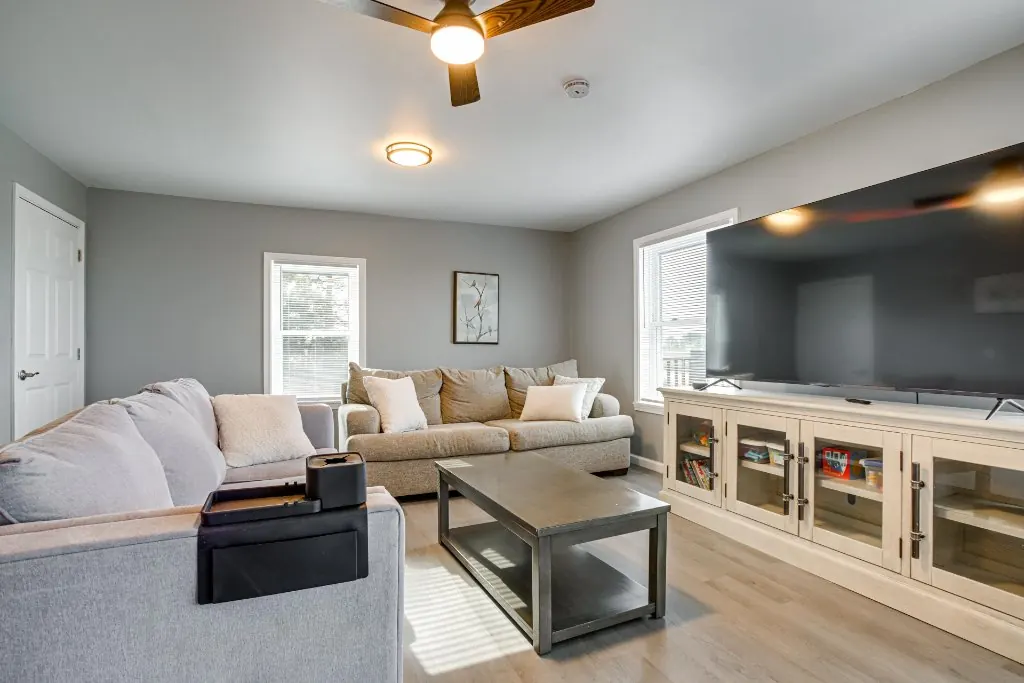 A big, comfortable downstairs living room at The Bayside Escape